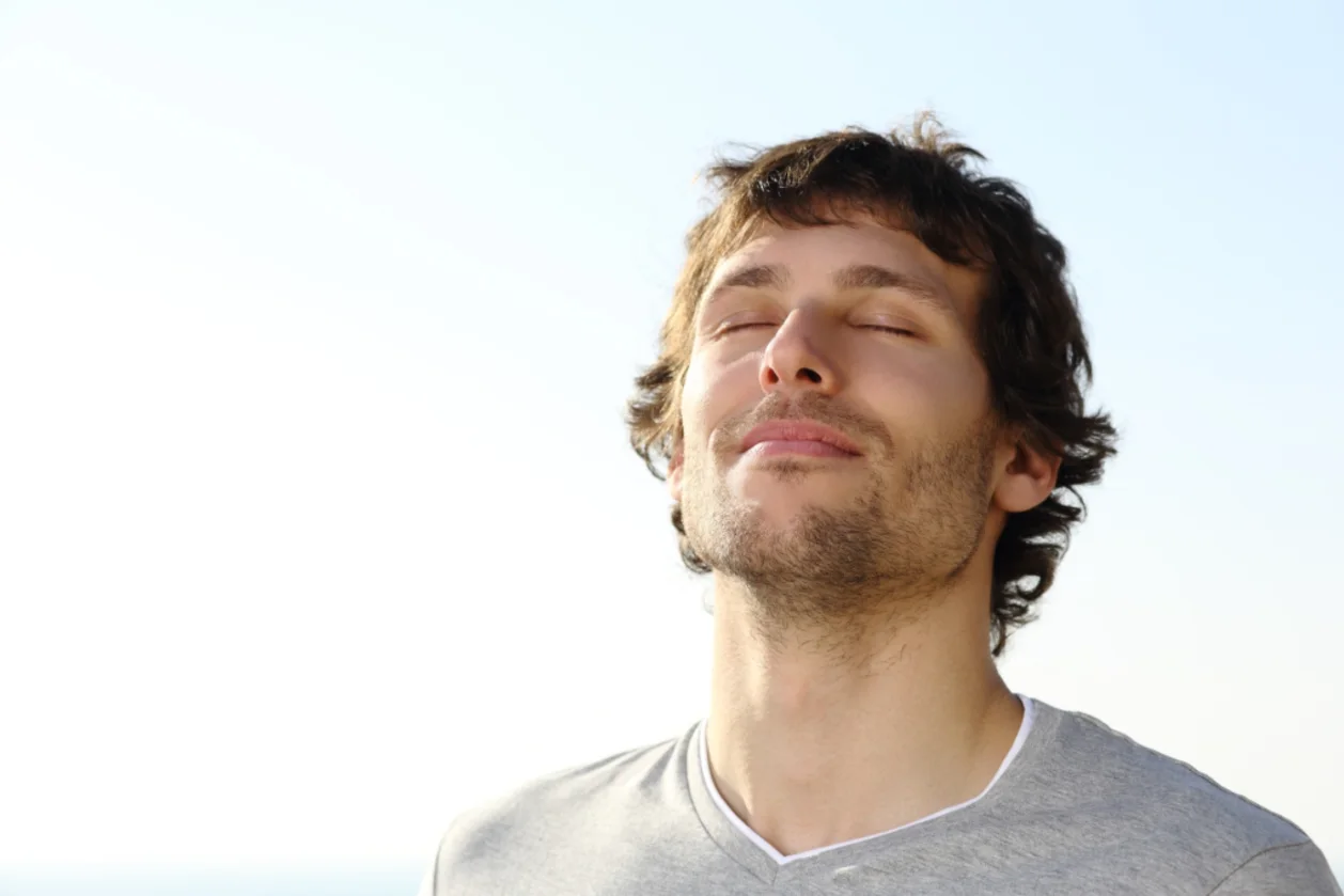 attractive man practicing breathwork